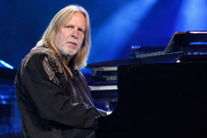 Rick Wakeman Biography – English progressive-rock keyboardist performing on stage.
